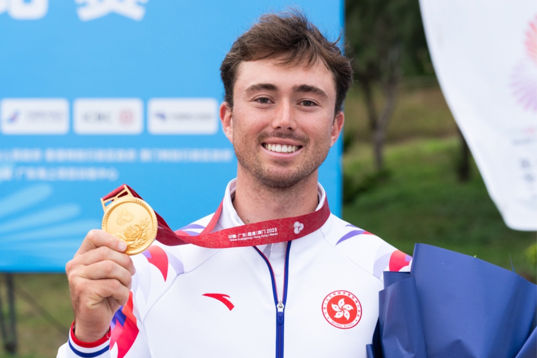 貝俊龍在第十五屆全國運動會勇奪男子愛爾卡7級(ILCA 7)金牌，為香港贏得十五運會首面金牌。(2025)  相片: 康樂及文化事務署